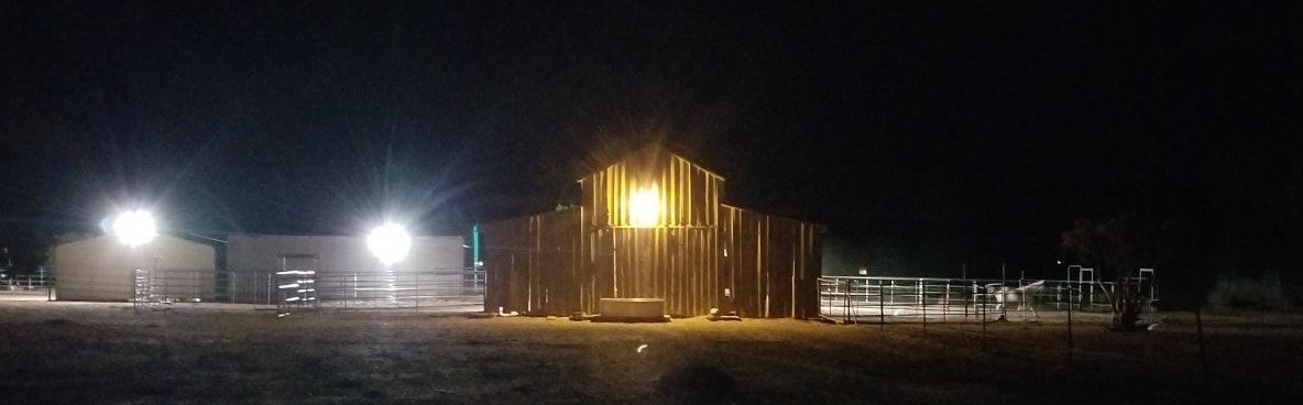 The barn lit up after electricity and lights installed